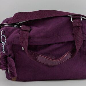 Kipling purple satchel with monkey